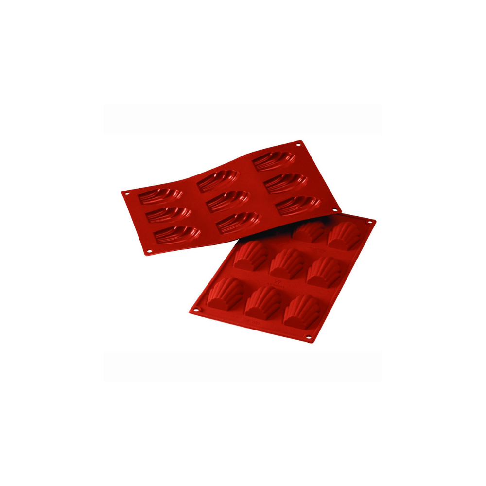 Moule flexible madeleine 9 empreintes dimension 68x45 hauteur 17mm Moule flexible madeleine 9 empreintes dimension 68x45 hauteur 17mm